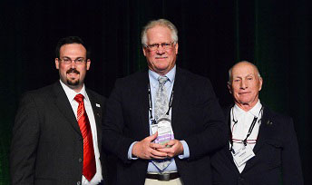 Bruce Suddeth, University of South Carolina-Upstate, receives the George Toma "Golden Rake" Award